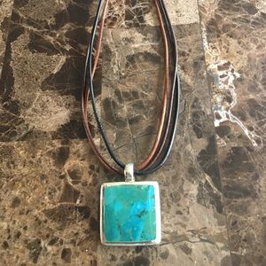 Necklace-Unique stone with leather necklace.